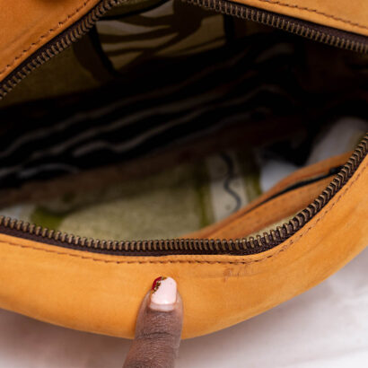 Brown Hair On Leather Sling Bag