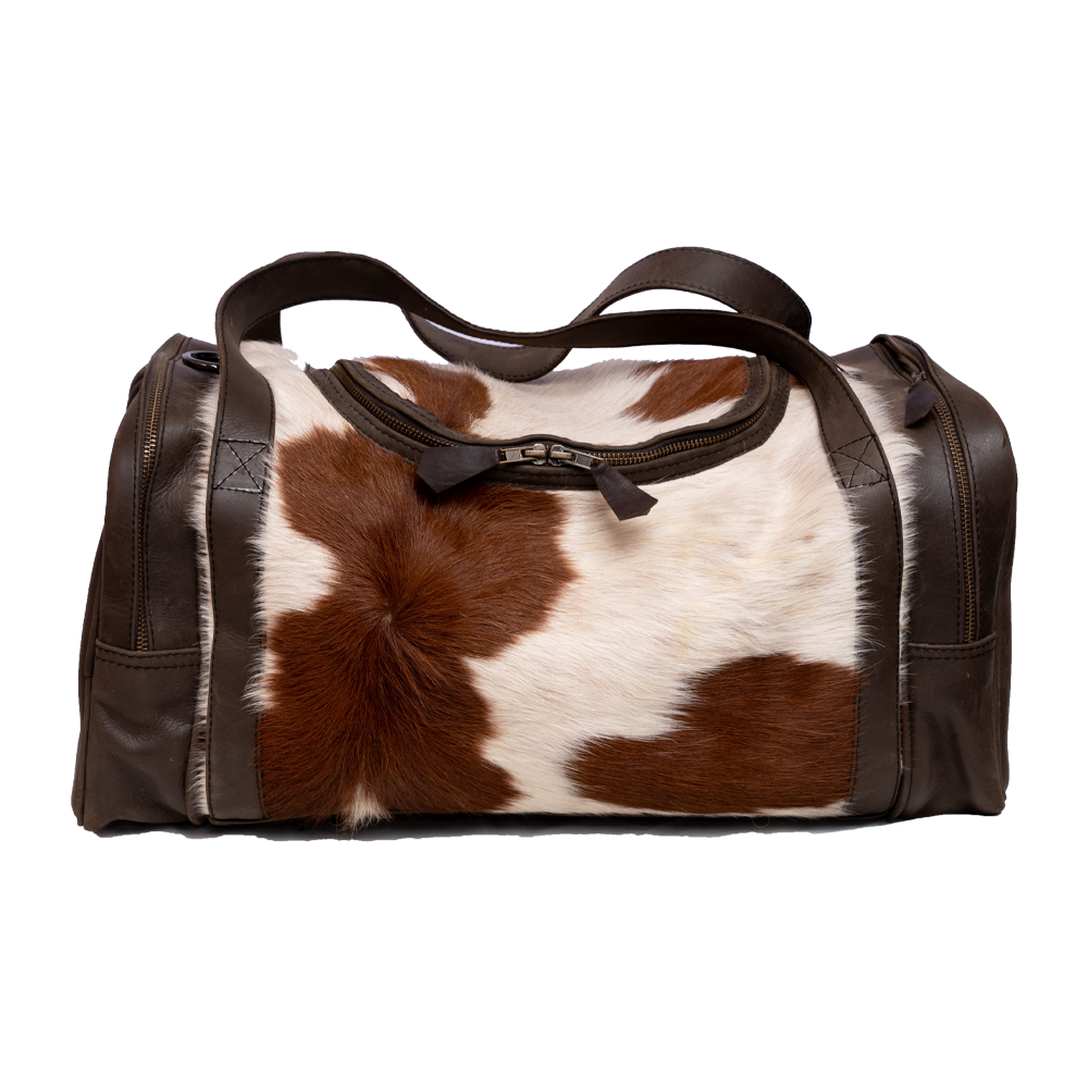 Dark Brown Hair On Leather Travel Bag