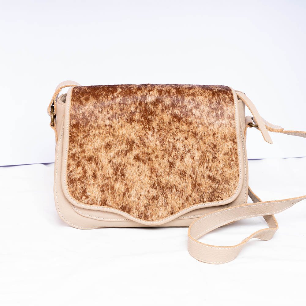 Brown Hair On Leather Bag